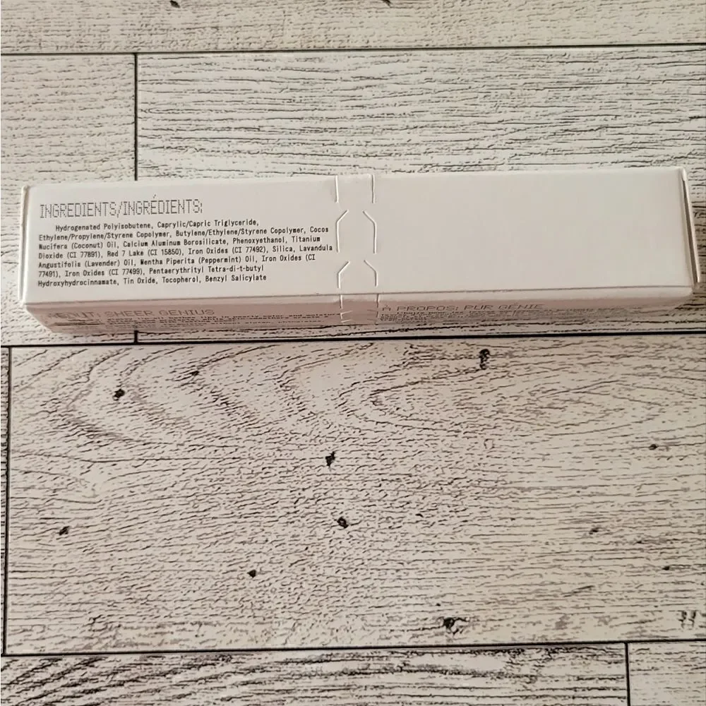 About Face Light Lock Lip Gloss in Angel on Fire
